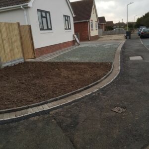 Driveway with Charcoal Block Paving and Gravel in Whitstable