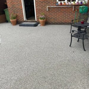 Resin Bound Patio with a Paved Border in Park Farm,…