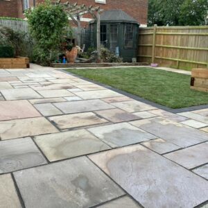 Indian Sandstone Patio with Roll-On Turf and Sleepers in Kings…