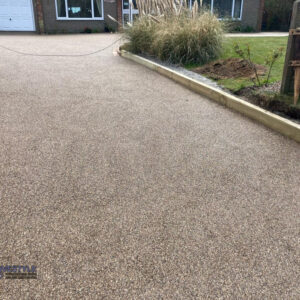 Resin Bound Driveway with Sleeper and Brick Border in Ashford