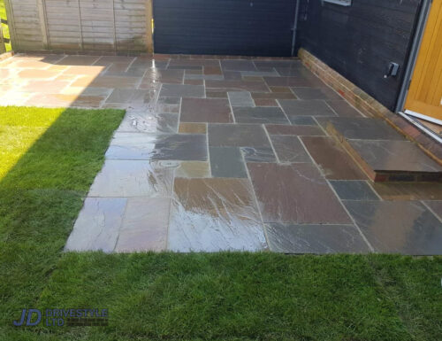 Slabbed Patio with Sleeper Wall and Doorstep in Canterbury
