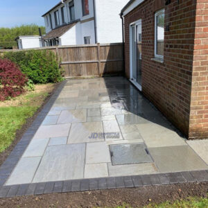 Patio with Indian Sandstone Slabs in Ashford, Kent