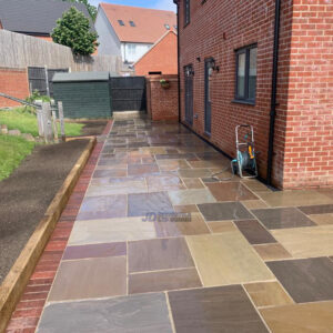 Indian Sandstone Patio with Brick Border and Sleepers in Ashford,…